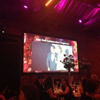 A Very Blurry Image of Yours Truly Presenting an Award