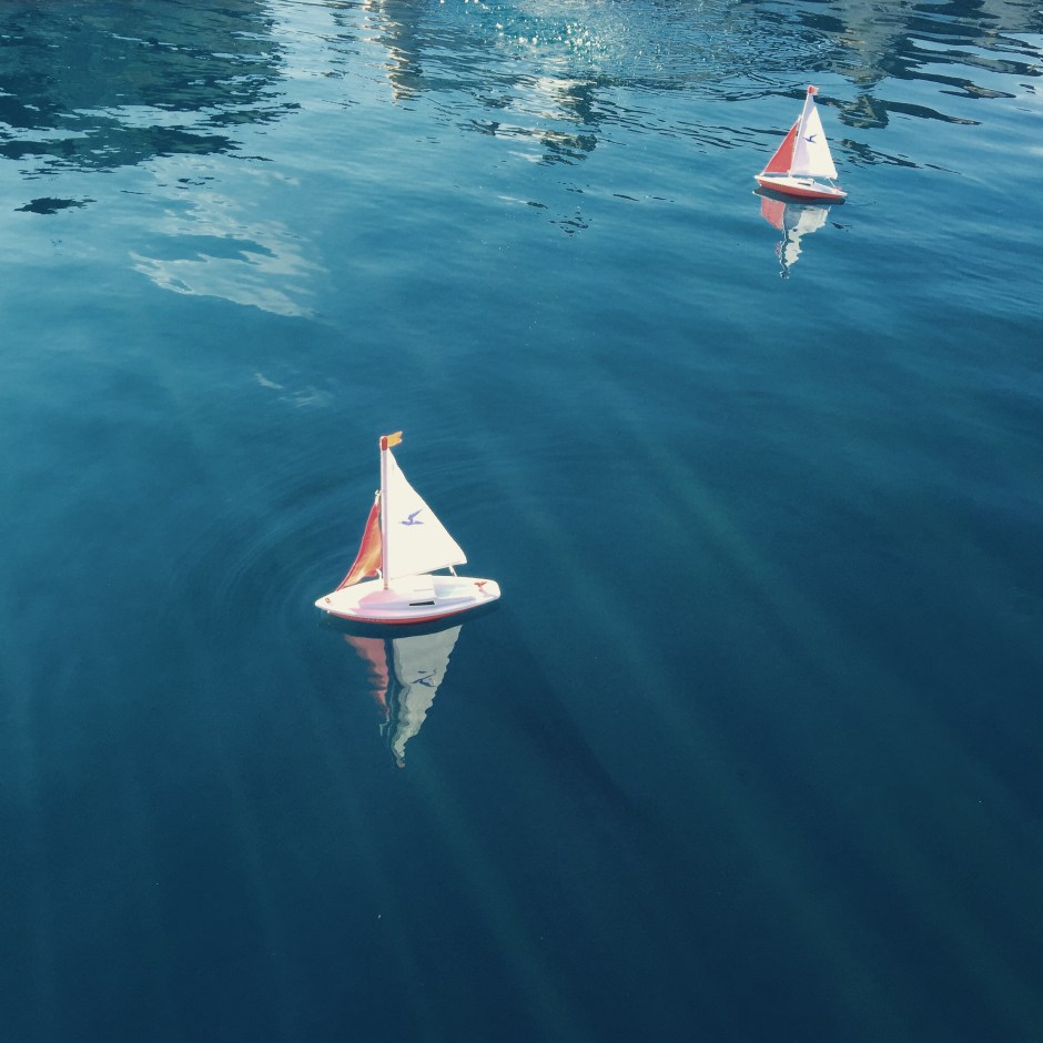 "Toy boats on a toy lake. Chlorine brings back memories of summer swimming lessons and endless hours in the water."